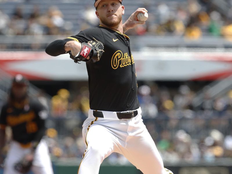 May 12, 2024; Pittsburgh, Pennsylvania, USA;  Pittsburgh Pirates starting pitcher Bailey Falter (26) delivers a pitch against the Chicago Cubs during the first inning at PNC Park. Mandatory Credit: Charles LeClaire-USA TODAY Sports