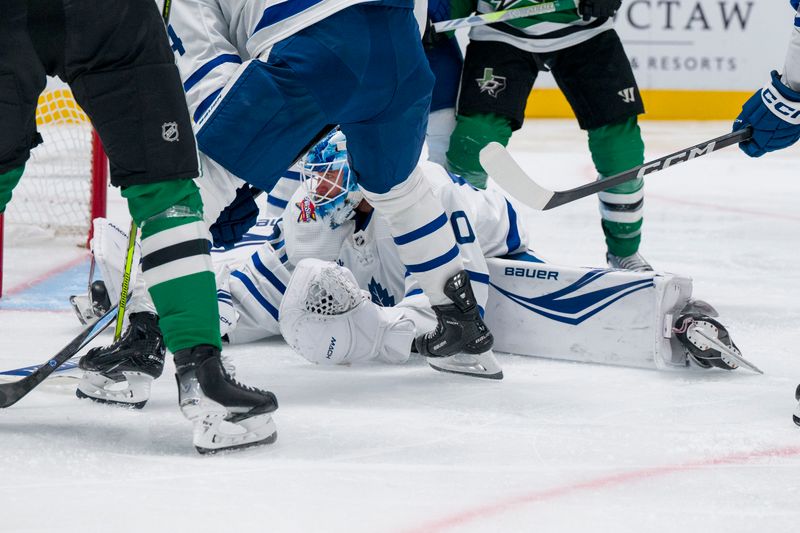 Oct 26, 2023; Dallas, Texas, USA; Toronto Maple Leafs goaltender Joseph Woll (60) makes a pad save on a \Dallas Stars shot during the second period at the American Airlines Center. Mandatory Credit: Jerome Miron-USA TODAY Sports