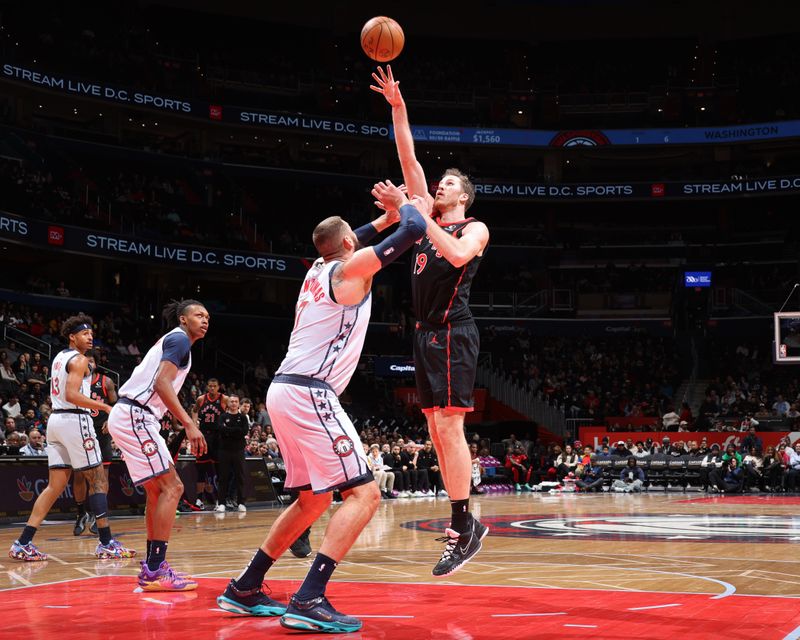 WASHINGTON, DC -?JANUARY 29: Jakob Poeltl #19 of the Toronto Raptors shoots the ball during the game against the Washington Wizards on January 29, 2025 at Capital One Arena in Washington, DC. NOTE TO USER: User expressly acknowledges and agrees that, by downloading and or using this Photograph, user is consenting to the terms and conditions of the Getty Images License Agreement. Mandatory Copyright Notice: Copyright 2025 NBAE (Photo by Stephen Gosling/NBAE via Getty Images)