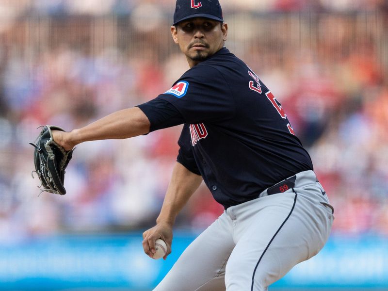 Jul 27, 2024; Philadelphia, Pennsylvania, USA;  Cleveland Guardians pitcher Carlos Carrasco (59) throws a pitch during the first inning against the Philadelphia Phillies at Citizens Bank Park. Mandatory Credit: Bill Streicher-USA TODAY Sports