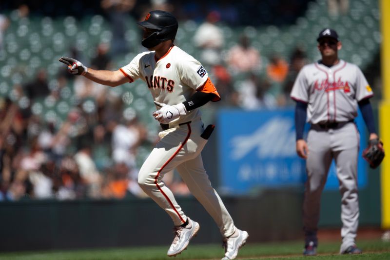 Aug 15, 2024; San Francisco, California, USA; San Francisco Giants second baseman Casey Schmitt (10) rounds the bases after hitting a two run home run against the Atlanta Braves during the sixth inning at Oracle Park. Mandatory Credit: D. Ross Cameron-USA TODAY Sports