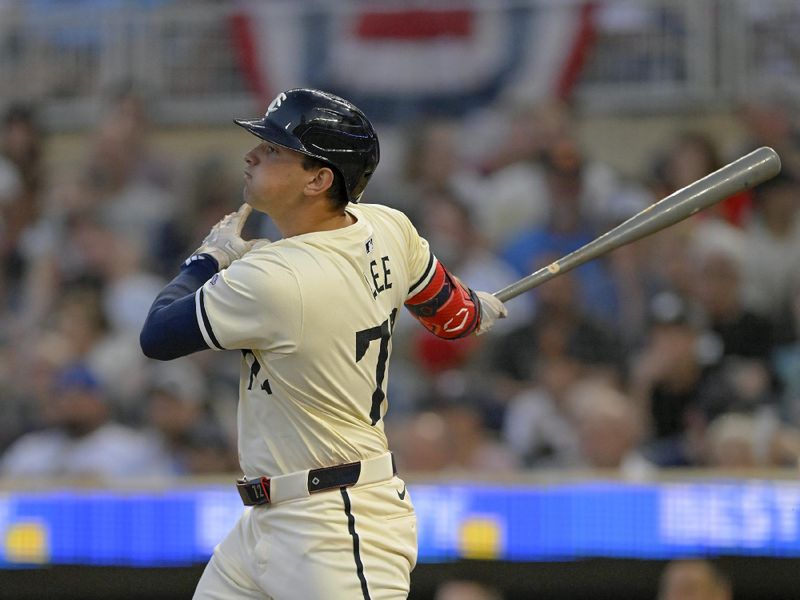 Jul 3, 2024; Minneapolis, Minnesota, USA;  Minnesota Twins infielder Brooks Lee (72) hits an RBI single against the Detroit Tigers during the seventh inning at Target Field. Mandatory Credit: Nick Wosika-USA TODAY Sports