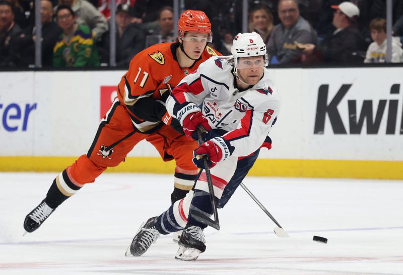 Mar 11, 2025; Anaheim, California, USA; Washington Capitals defenseman Jakob Chychrun (6) skates against Anaheim Ducks center Trevor Zegras (11) during the first period at Honda Center. Mandatory Credit: Jason Parkhurst-Imagn Images