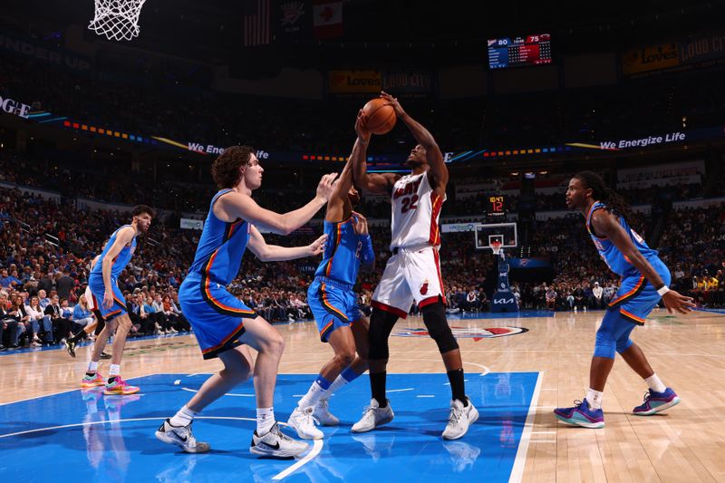 OKLAHOMA CITY, OK - MARCH 8:  Jimmy Butler #22 of the Miami Heat handles the ball during the game against the Oklahoma City Thunder on March 8, 2024 at Paycom Arena in Oklahoma City, Oklahoma. NOTE TO USER: User expressly acknowledges and agrees that, by downloading and or using this photograph, User is consenting to the terms and conditions of the Getty Images License Agreement. Mandatory Copyright Notice: Copyright 2024 NBAE (Photo by Zach Beeker/NBAE via Getty Images)