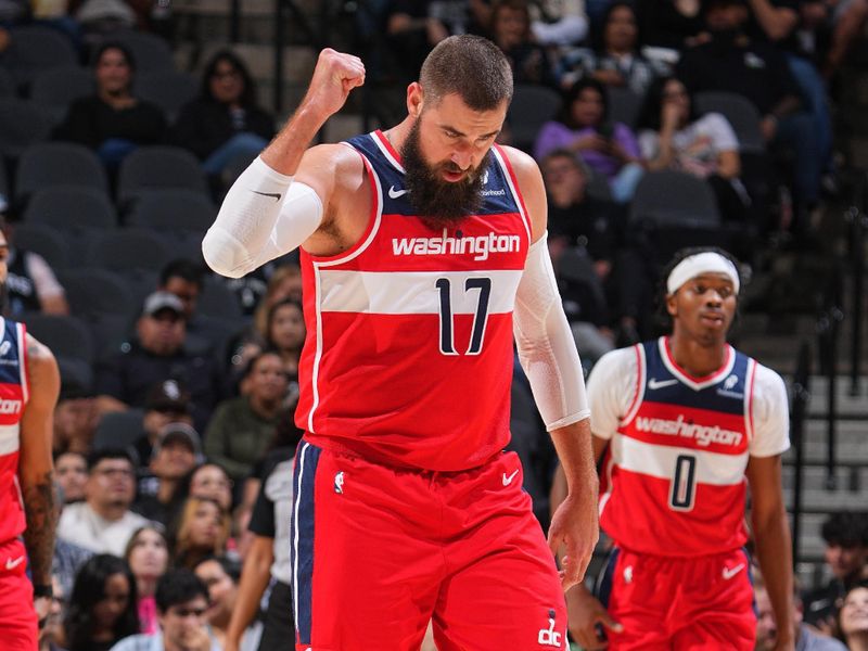 SAN ANTONIO, TX - NOVEMBER 13: Jonas Valanciunas #17 of the Washington Wizards celebrates during the game against the San Antonio Spurs on November 13, 2024 at the Frost Bank Center in San Antonio, Texas. NOTE TO USER: User expressly acknowledges and agrees that, by downloading and or using this photograph, user is consenting to the terms and conditions of the Getty Images License Agreement. Mandatory Copyright Notice: Copyright 2024 NBAE (Photos byGarrett Ellwood/NBAE via Getty Images)