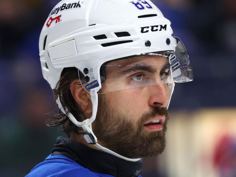 Oct 15, 2025; Buffalo, New York, USA;  Buffalo Sabres right wing Alex Tuch (89) during a stoppage in play against the Ottawa Senators at KeyBank Center. Mandatory Credit: Timothy T. Ludwig-Imagn Images