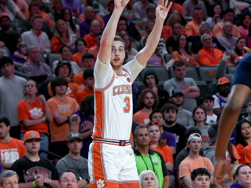 Feb 26, 2025; Clemson, South Carolina, USA; Clemson guard Jake Heidbreder (3) shoots a three-point shot against Notre Dame during the second half at Littlejohn Coliseum. Mandatory Credit: Ken Ruinard-Imagn Images