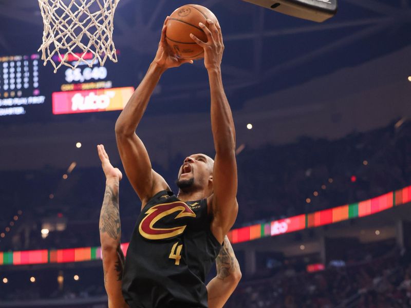 CLEVELAND, OH - FEBUARY 2:  Evan Mobley #4 of the Cleveland Cavaliers drives to the basket during the game on Febuary 2, 2023 at Rocket Mortgage FieldHouse in Cleveland, Ohio. NOTE TO USER: User expressly acknowledges and agrees that, by downloading and/or using this Photograph, user is consenting to the terms and conditions of the Getty Images License Agreement. Mandatory Copyright Notice: Copyright 2023 NBAE (Photo by  Lauren Bacho/NBAE via Getty Images)