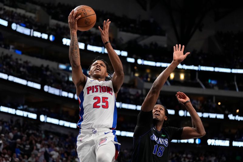 DALLAS, TEXAS - APRIL 12: Marcus Sasser #25 of the Detroit Pistons drives to the basket past Olivier-Maxence Prosper #18 of the Dallas Mavericks during the second half at American Airlines Center on April 12, 2024 in Dallas, Texas. NOTE TO USER: User expressly acknowledges and agrees that, by downloading and or using this photograph, User is consenting to the terms and conditions of the Getty Images License Agreement. (Photo by Sam Hodde/Getty Images)