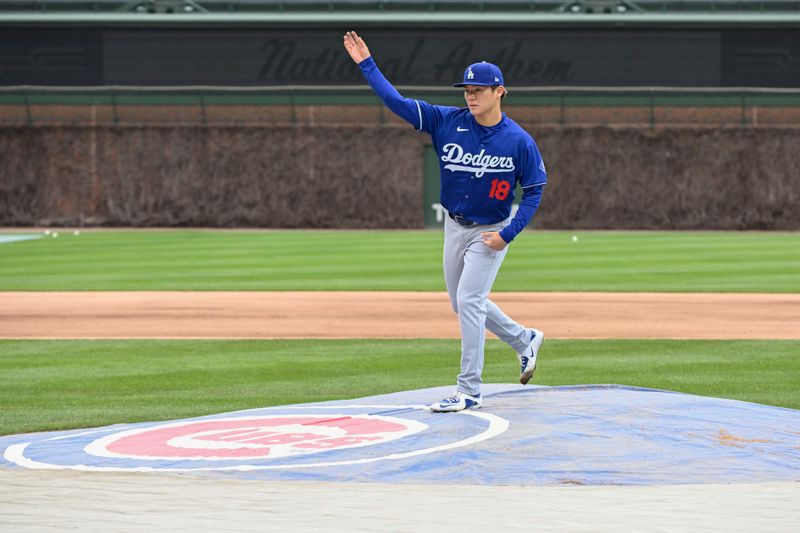 Apr 5, 2024; Chicago, Illinois, USA;  Los Angeles Dodgers pitcher Yoshinobu Yamamoto (18) warms up before the game against the Chicago Cubs at Wrigley Field. Mandatory Credit: Matt Marton-USA TODAY Sports