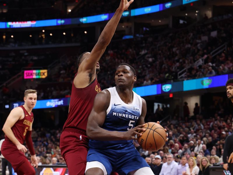 CLEVELAND, OH - March 8: Anthony Edwards #5 of the Minnesota Timberwolves handles the ball during the game against the Cleveland Cavaliers on March 8, 2024 at Rocket Mortgage FieldHouse in Cleveland, Ohio. NOTE TO USER: User expressly acknowledges and agrees that, by downloading and/or using this Photograph, user is consenting to the terms and conditions of the Getty Images License Agreement. Mandatory Copyright Notice: Copyright 2024 NBAE (Photo by Lauren Leigh Bacho/NBAE via Getty Images)