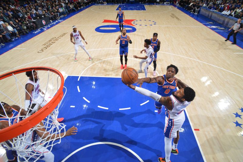 PHILADELPHIA, PA - JANUARY 15: Paul George #8 of the Philadelphia 76ers goes up for the rebound during the game against the New York Knicks on January 15, 2025 at the Wells Fargo Center in Philadelphia, Pennsylvania NOTE TO USER: User expressly acknowledges and agrees that, by downloading and/or using this Photograph, user is consenting to the terms and conditions of the Getty Images License Agreement. Mandatory Copyright Notice: Copyright 2025 NBAE (Photo by Jesse D. Garrabrant/NBAE via Getty Images)