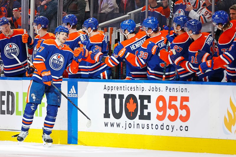 Apr 15, 2024; Edmonton, Alberta, CAN; The Edmonton Oilers celebrate a goal scored by forward Warren Foegele (37) during the second period against the San Jose Sharks at Rogers Place. Mandatory Credit: Perry Nelson-USA TODAY Sports