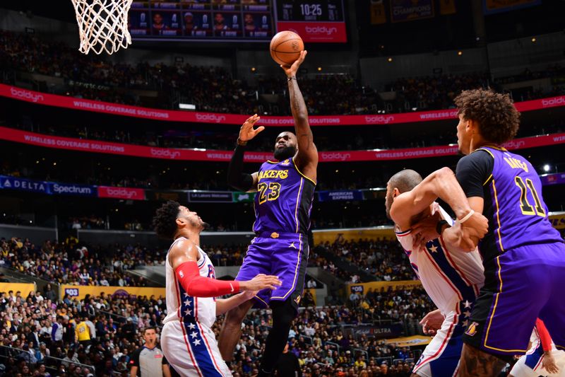 LOS ANGELES, CA - MARCH 22: LeBron James #23 of the Los Angeles Lakers shoots the ball during the game against the Philadelphia 76ers on March 22, 2024 at Crypto.Com Arena in Los Angeles, California. NOTE TO USER: User expressly acknowledges and agrees that, by downloading and/or using this Photograph, user is consenting to the terms and conditions of the Getty Images License Agreement. Mandatory Copyright Notice: Copyright 2024 NBAE (Photo by Adam Pantozzi/NBAE via Getty Images)