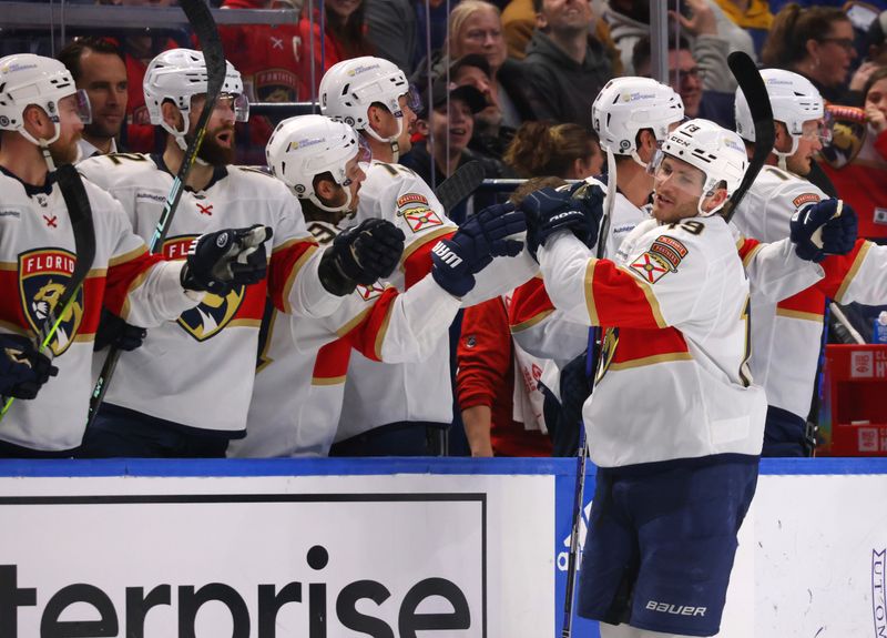 Feb 15, 2024; Buffalo, New York, USA;  Florida Panthers left wing Matthew Tkachuk (19) celebrates his goal with teammates during the second period against the Buffalo Sabres at KeyBank Center. Mandatory Credit: Timothy T. Ludwig-USA TODAY Sports