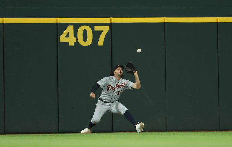 Jun 28, 2023; Arlington, Texas, USA;  Detroit Tigers center fielder Jake Marisnick (15) makes a catch during the seventh inning against the Texas Rangers at Globe Life Field. Mandatory Credit: Kevin Jairaj-USA TODAY Sports