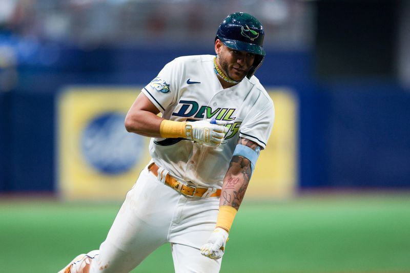 May 26, 2023; St. Petersburg, Florida, USA;  Tampa Bay Rays center fielder Jose Siri (22) reacts after hitting a two run home run against the Los Angeles Dodgers in the eighth inning at Tropicana Field. Mandatory Credit: Nathan Ray Seebeck-USA TODAY Sports