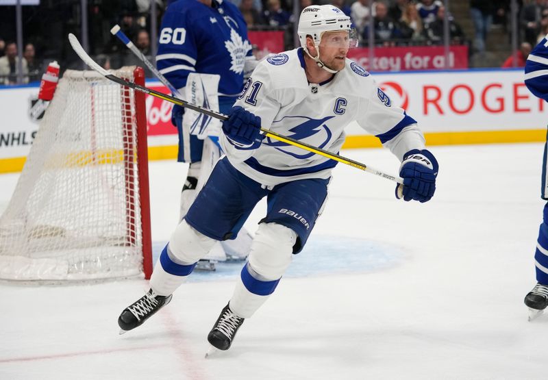 Apr 3, 2024; Toronto, Ontario, CAN; Tampa Bay Lightning forward Steven Stamkos (91) skates against the Toronto Maple Leafs during the third period at Scotiabank Arena. Mandatory Credit: John E. Sokolowski-USA TODAY Sports