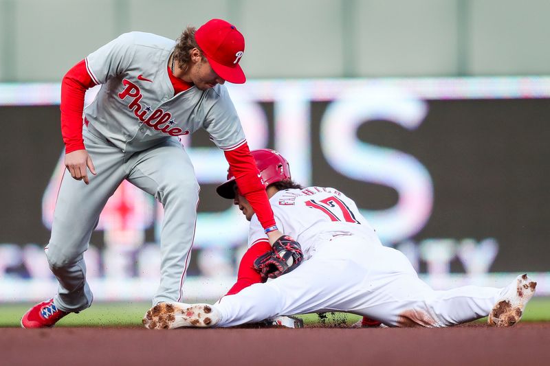 Apr 22, 2024; Cincinnati, Ohio, USA; Philadelphia Phillies second baseman Bryson Stott (5) tags Cincinnati Reds outfielder Stuart Fairchild (17) out at second in the first inning at Great American Ball Park. Mandatory Credit: Katie Stratman-USA TODAY Sports