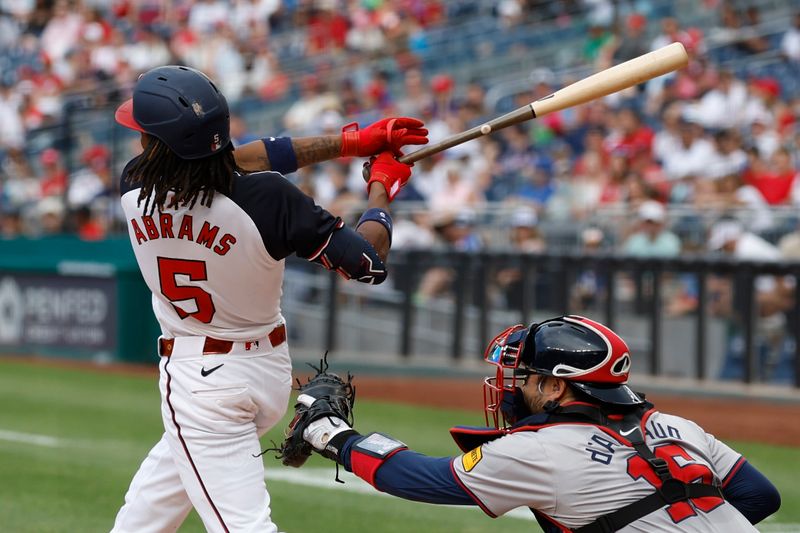 Jun 9, 2024; Washington, District of Columbia, USA; Washington Nationals shortstop CJ Abrams (5) hits a three run double against the Atlanta Braves during the fourth inning at Nationals Park. Mandatory Credit: Geoff Burke-USA TODAY Sports