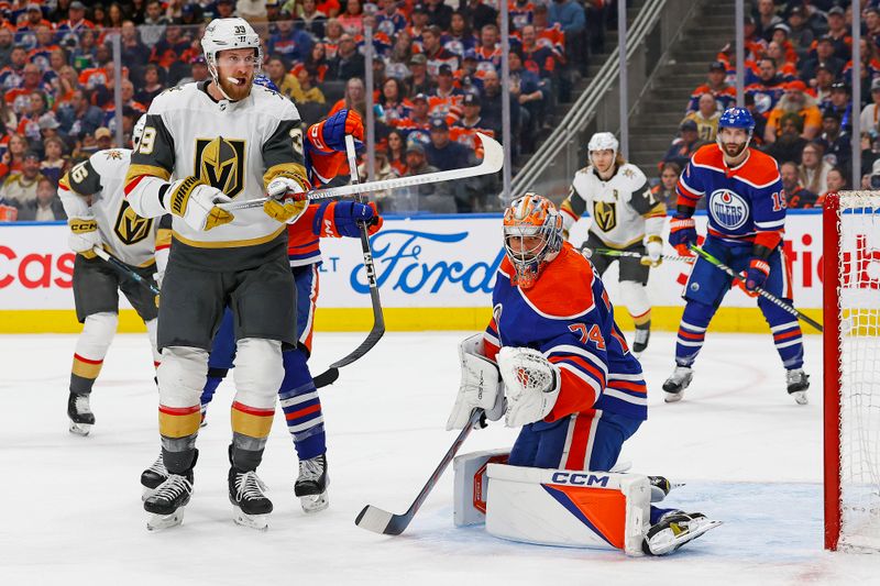 Apr 10, 2024; Edmonton, Alberta, CAN; Vegas Golden Knights forward Anthony Mantha (39) tries to deflect a shot on Edmonton Oilers goaltender Stuart Skinner (74) during the second period at Rogers Place. Mandatory Credit: Perry Nelson-USA TODAY Sports