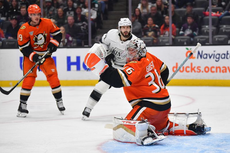 Nov 29, 2024; Anaheim, California, USA; Anaheim Ducks goaltender John Gibson (36) defends the goal against Los Angeles Kings center Phillip Danault (24) during the third period at Honda Center. Mandatory Credit: Gary A. Vasquez-Imagn Images