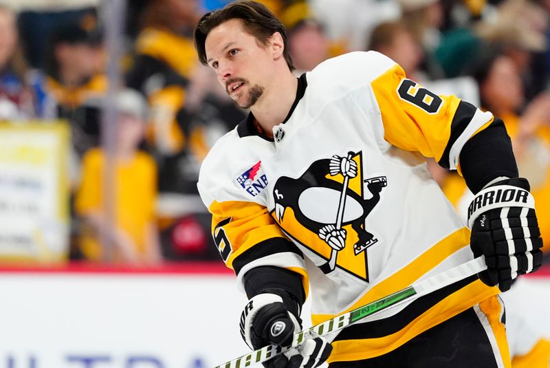 Mar 16, 2026; Denver, Colorado, USA; Pittsburgh Penguins defenseman Erik Karlsson (65) before the game against the Colorado Avalanche at Ball Arena. Mandatory Credit: Ron Chenoy-Imagn Images