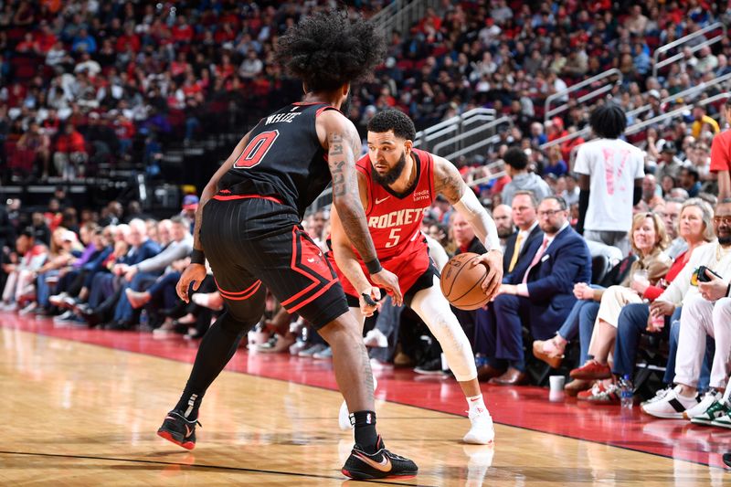 HOUSTON, TX - MARCH 21:   Fred VanVleet #5 of the Houston Rockets handles the ball during the game against the Chicago Bulls on March 21, 2024 at the Toyota Center in Houston, Texas. NOTE TO USER: User expressly acknowledges and agrees that, by downloading and or using this photograph, User is consenting to the terms and conditions of the Getty Images License Agreement. Mandatory Copyright Notice: Copyright 2024 NBAE (Photo by Logan Riely/NBAE via Getty Images)