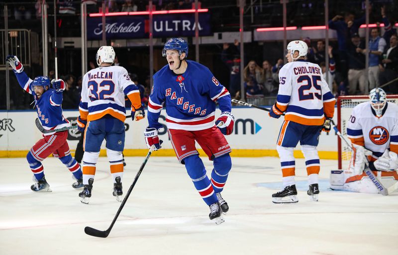 Sep 24, 2024; New York, New York, USA; New York Rangers center Adam Edstrom (84) celebrates his game-winning goal against the New York Islanders during the third period at Madison Square Garden. Mandatory Credit: Danny Wild-Imagn Images