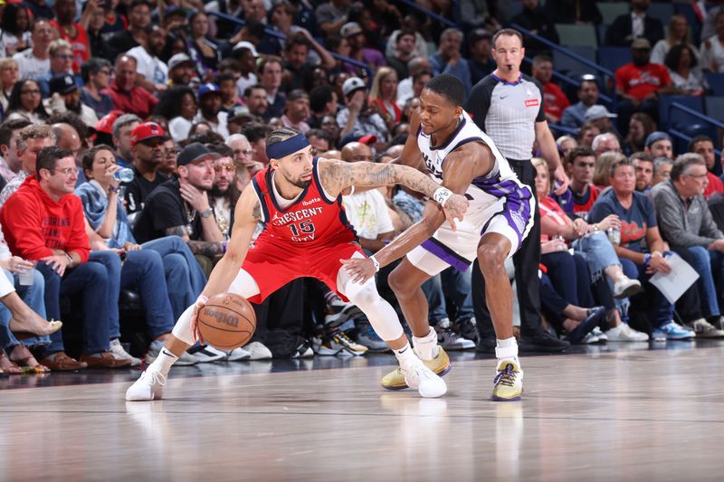 NEW ORLEANS, LA - APRIL 19:  De'Aaron Fox #5 of the Sacramento Kings plays defense during the game  against Jose Alvarado #15 of the New Orleans Pelicans during the 2024 Play-In Tournament on April 19, 2024 at the Smoothie King Center in New Orleans, Louisiana. NOTE TO USER: User expressly acknowledges and agrees that, by downloading and or using this Photograph, user is consenting to the terms and conditions of the Getty Images License Agreement. Mandatory Copyright Notice: Copyright 2024 NBAE (Photo by Jeff Haynes./NBAE via Getty Images)