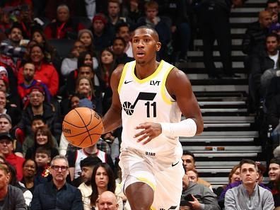 TORONTO, CANADA - DECEMBER 23:  Kris Dunn #11 of the Utah Jazz handles the ball during the game against the Toronto Raptors on December 23, 2023 at the Scotiabank Arena in Toronto, Ontario, Canada.  NOTE TO USER: User expressly acknowledges and agrees that, by downloading and or using this Photograph, user is consenting to the terms and conditions of the Getty Images License Agreement.  Mandatory Copyright Notice: Copyright 2023 NBAE (Photo by Vaughn Ridley/NBAE via Getty Images)