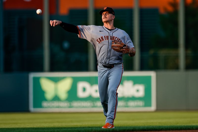 Sep 3, 2025; Denver, Colorado, USA; San Francisco Giants third baseman Matt Chapman (26) warms up before the game against the Colorado Rockies at Coors Field. Mandatory Credit: Isaiah J. Downing-Imagn Images