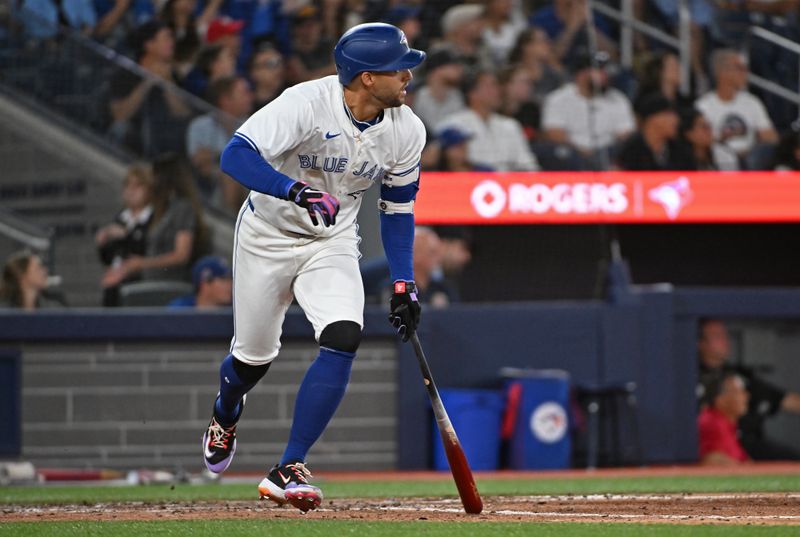 Aug 11, 2024; Toronto, Ontario, CAN; Toronto Blue Jays right field George Springer (4) hits an RBI single in the eighth inning against the Oakland Athletics at Rogers Centre. Mandatory Credit: Gerry Angus-USA TODAY Sports