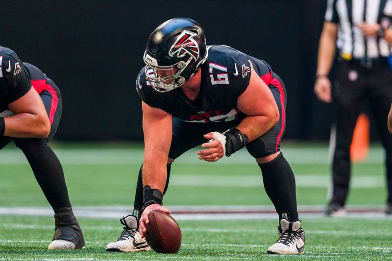 Atlanta Falcons center Drew Dalman (67) lines up during the first half of an NFL football game against the Houston Texans, Sunday, Oct. 8, 2023, in Atlanta. The Atlanta Falcons won 21-19. (AP Photo/Danny Karnik)