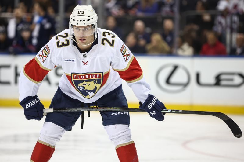 Oct 24, 2024; New York, New York, USA;  Florida Panthers center Carter Verhaeghe (23) prepares for a faceoff in the first period against the New York Rangers at Madison Square Garden. Mandatory Credit: Wendell Cruz-Imagn Images