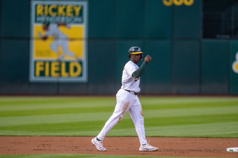 Aug 5, 2024; Oakland, California, USA;  Oakland Athletics right fielder Daz Cameron (28) advances to second on a wild pitch by Chicago White Sox starting pitcher Ky Bush (not pictured) during the first inning at Oakland-Alameda County Coliseum. Mandatory Credit: Neville E. Guard-USA TODAY Sports