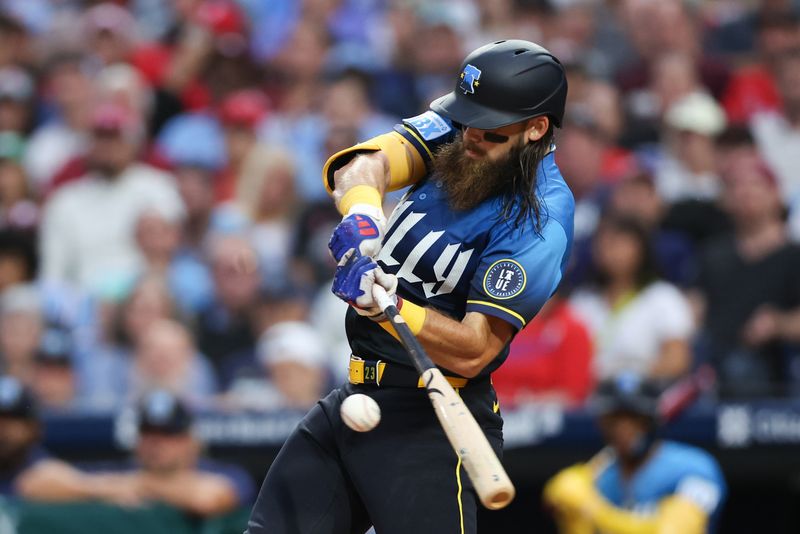 Aug 30, 2024; Philadelphia, Pennsylvania, USA; Philadelphia Phillies outfielder Brandon Marsh (16) hits a single during the second inning against the Atlanta Braves at Citizens Bank Park. Mandatory Credit: Bill Streicher-USA TODAY Sports