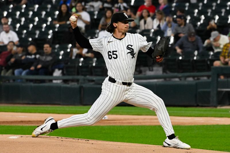 Sep 25, 2024; Chicago, Illinois, USA;  Chicago White Sox pitcher Davis Martin (65) delivers during the first inning against the Los Angeles Angels at Guaranteed Rate Field. Mandatory Credit: Matt Marton-Imagn Images