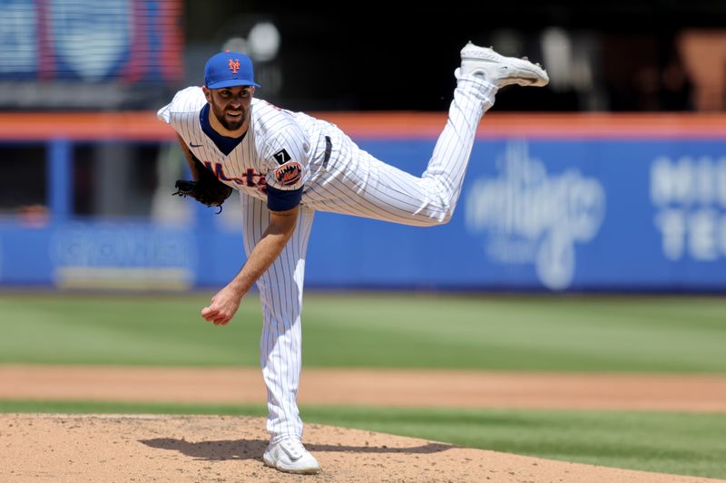 Apr 23, 2025; New York City, New York, USA; New York Mets starting pitcher David Peterson (23) follows through on a pitch against the Philadelphia Phillies during the third inning at Citi Field. Mandatory Credit: Brad Penner-Imagn Images