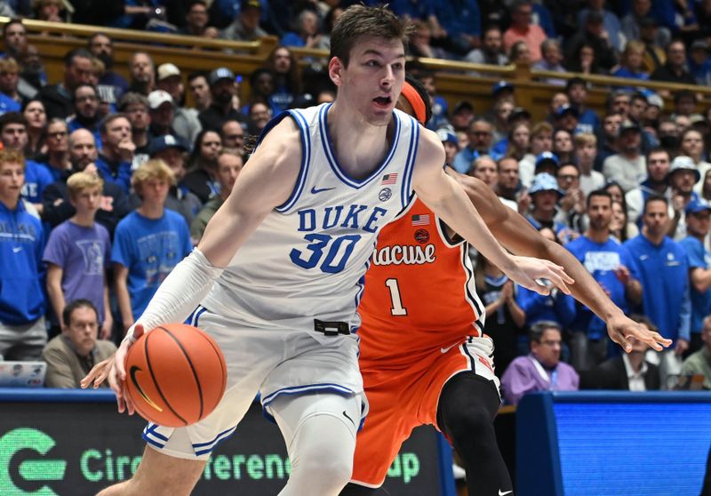 Jan 2, 2024; Durham, North Carolina, USA;  Duke Blue Devils center Kyle Filipowski (30) drives to the basket as Syracuse Orange forward Maliq Brown (1) defends during the second half at Cameron Indoor Stadium.  The Blue Devils won 86-66. Mandatory Credit: Rob Kinnan-USA TODAY Sports