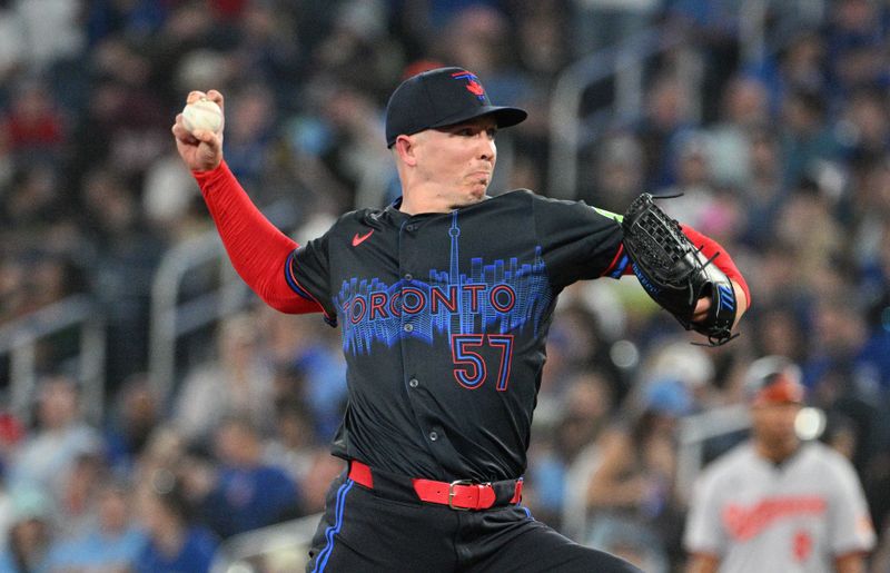 Jun 5, 2024; Toronto, Ontario, CAN;  Toronto Blue Jays relief pitcher Chad Green (57) delivers a pitch against the Baltimore Orioles in the eighth inning at Rogers Centre. Mandatory Credit: Dan Hamilton-USA TODAY Sports 