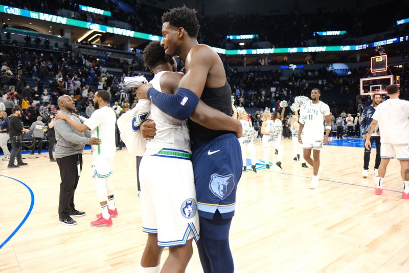 MINNEAPOLIS, MN -  JANUARY 18: Anthony Edwards #5 of the Minnesota Timberwolves and Jaren Jackson Jr. #13 of the Memphis Grizzlies embrace after the game on January 18, 2024 at Target Center in Minneapolis, Minnesota. NOTE TO USER: User expressly acknowledges and agrees that, by downloading and or using this Photograph, user is consenting to the terms and conditions of the Getty Images License Agreement. Mandatory Copyright Notice: Copyright 2024 NBAE (Photo by David Sherman/NBAE via Getty Images)