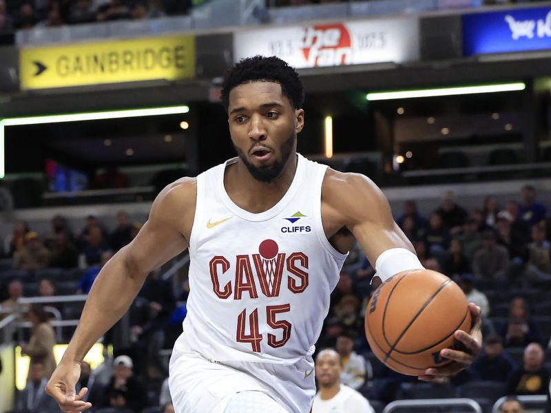 INDIANAPOLIS, INDIANA - JANUARY 14: Donovan Mitchell #45 of the Cleveland Cavaliers saves the ball against the Indiana Pacers during the first half at Gainbridge Fieldhouse on January 14, 2025 in Indianapolis, Indiana. NOTE TO USER: User expressly acknowledges and agrees that, by downloading and or using this photograph, User is consenting to the terms and conditions of the Getty Images License Agreement. (Photo by Justin Casterline/Getty Images)