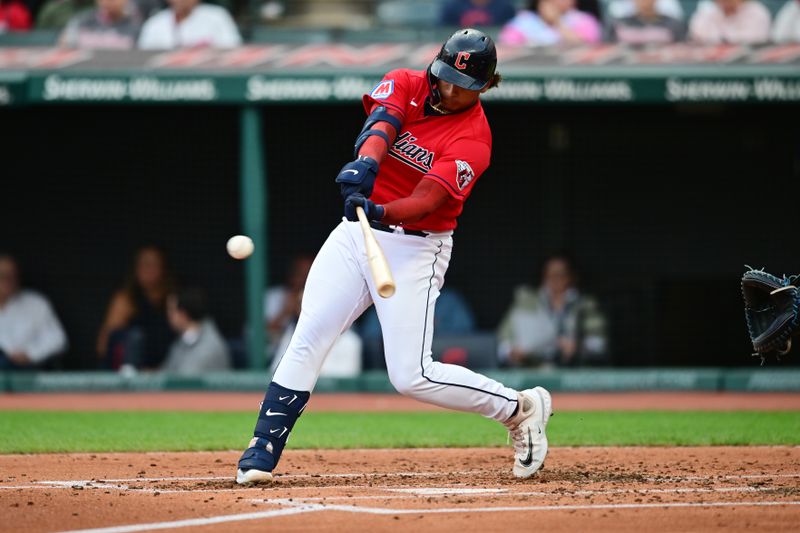 Sep 16, 2023; Cleveland, Ohio, USA; Cleveland Guardians catcher Bo Naylor (23) hits a single during the second inning against the Texas Rangers at Progressive Field. Mandatory Credit: Ken Blaze-USA TODAY Sports