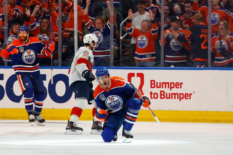 Jun 15, 2024; Edmonton, Alberta, CAN; Edmonton Oilers center Mattias Janmark (13) celebrates a goal in the first period against the Florida Panthers in game four of the 2024 Stanley Cup Final at Rogers Place. Mandatory Credit: Perry Nelson-USA TODAY Sports
