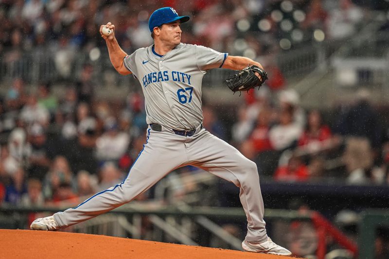 Sep 28, 2024; Cumberland, Georgia, USA; Kansas City Royals starting pitcher Seth Lugo (67) pitches against the Atlanta Braves during the first inning at Truist Park. Mandatory Credit: Dale Zanine-Imagn Images