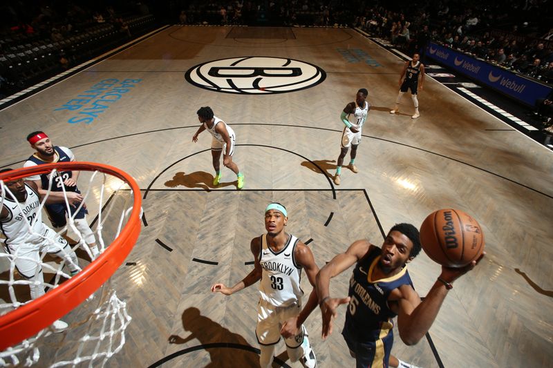 BROOKLYN, NY - MARCH 19: Herb Jones #5 of the New Orleans Pelicans drives to the basket during the game against the Brooklyn Nets on March 19, 2024 at Barclays Center in Brooklyn, New York. NOTE TO USER: User expressly acknowledges and agrees that, by downloading and or using this Photograph, user is consenting to the terms and conditions of the Getty Images License Agreement. Mandatory Copyright Notice: Copyright 2024 NBAE (Photo by Nathaniel S. Butler/NBAE via Getty Images)