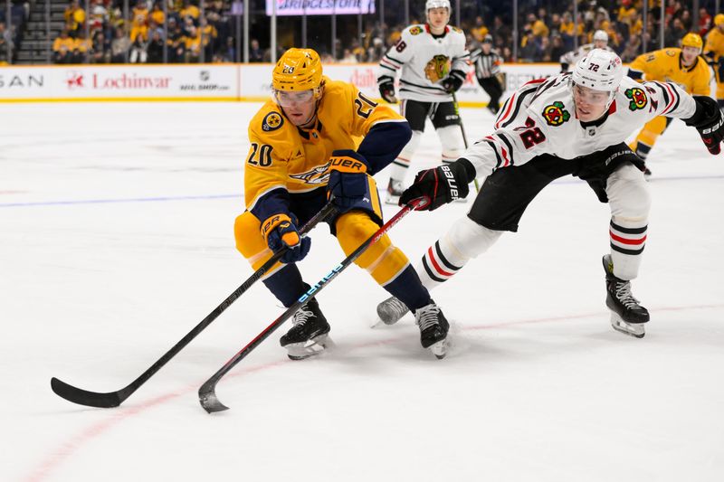 Jan 16, 2025; Nashville, Tennessee, USA;  Nashville Predators defenseman Justin Barron (20) and Chicago Blackhawks defenseman Alex Vlasic (72) during the third period at Bridgestone Arena. Mandatory Credit: Steve Roberts-Imagn Images