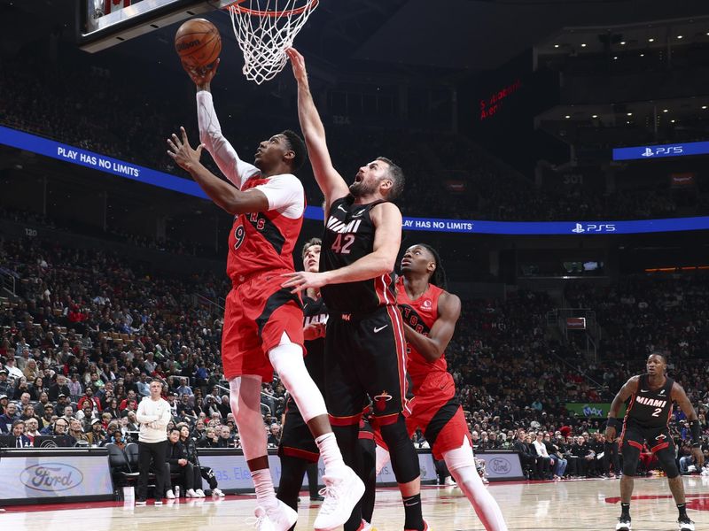 TORONTO, CANADA - DECEMBER 01:  RJ Barrett #9 of the Toronto Raptors shoots the ball during the game against the Miami Heat on December 1, 2024 at the Scotiabank Arena in Toronto, Ontario, Canada.  NOTE TO USER: User expressly acknowledges and agrees that, by downloading and or using this Photograph, user is consenting to the terms and conditions of the Getty Images License Agreement.  Mandatory Copyright Notice: Copyright 2024 NBAE (Photo by Vaughn Ridley/NBAE via Getty Images)