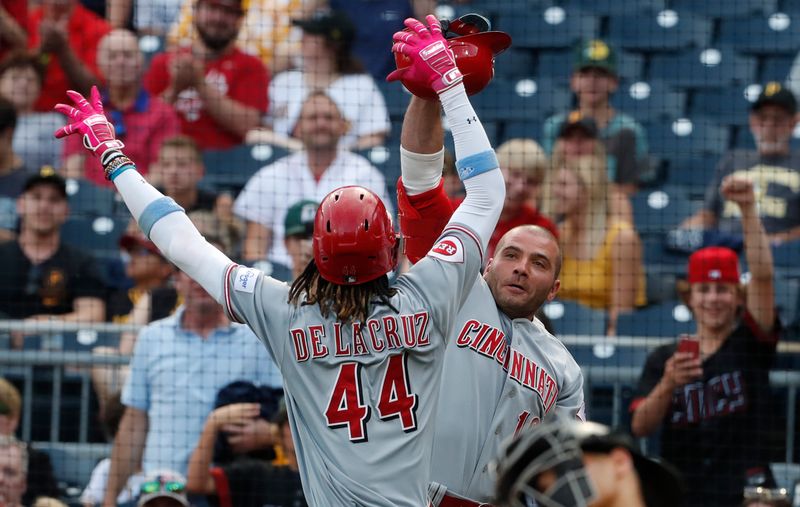 tAug 13, 2023; Pittsburgh, PA, USA; Cincinnati Reds shortstop Elly De La Cruz (44) celebrates his solo home run with designated hitter Joey Votto (right) against the Pittsburgh Pirates during the third inning at PNC Park. Mandatory Credit: Charles LeClaire-USA TODAY Sports